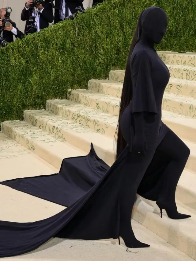 Kim Kardashian biography photo wearing iconic Balenciaga outfit at Met Gala